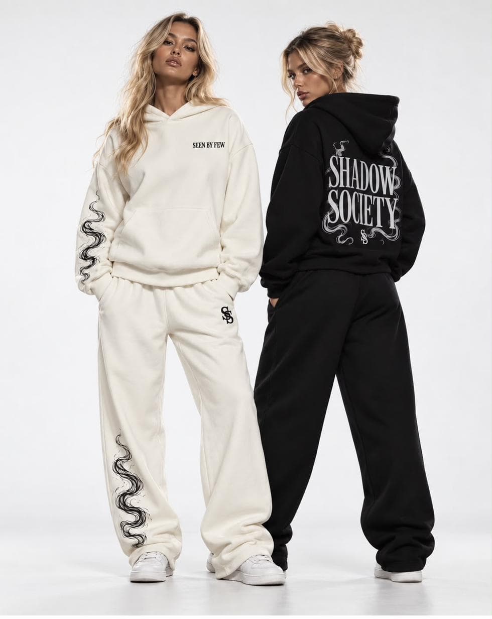 Two models in the Cream Set and the Black Set
